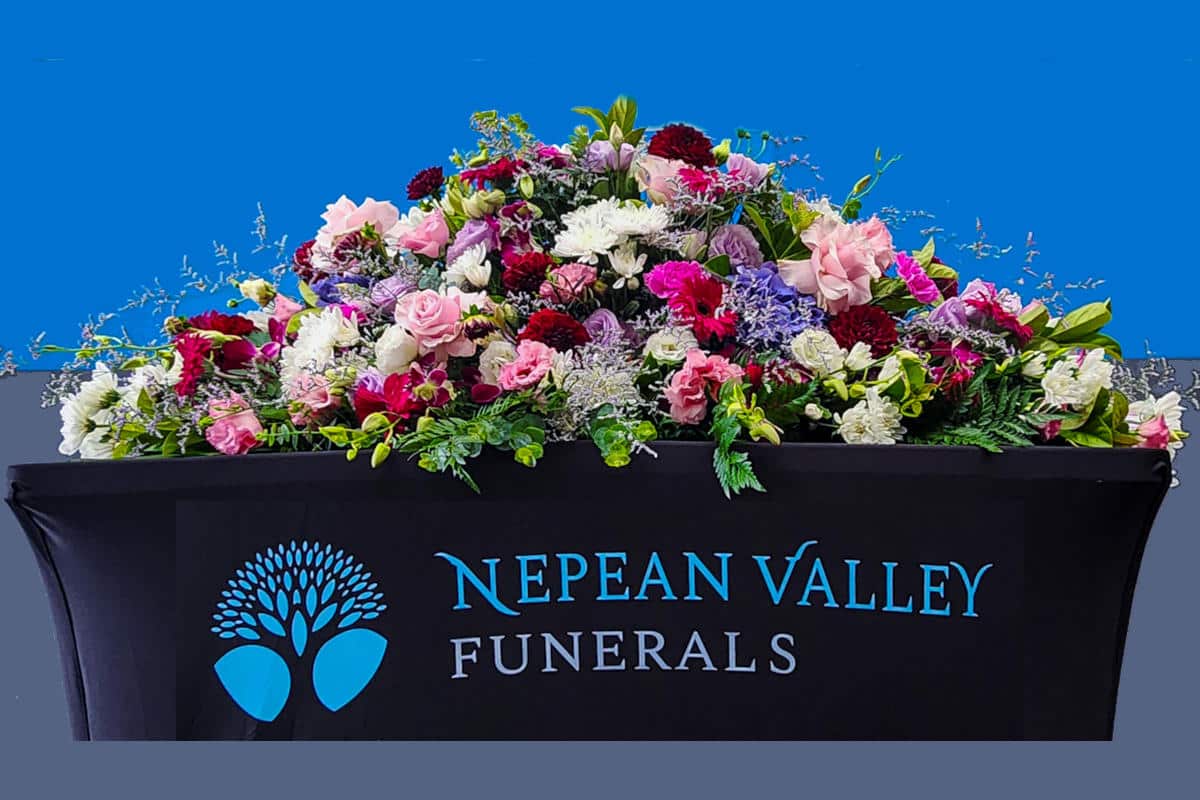 Funeral package – Mixed seasonal floral casket cover 2