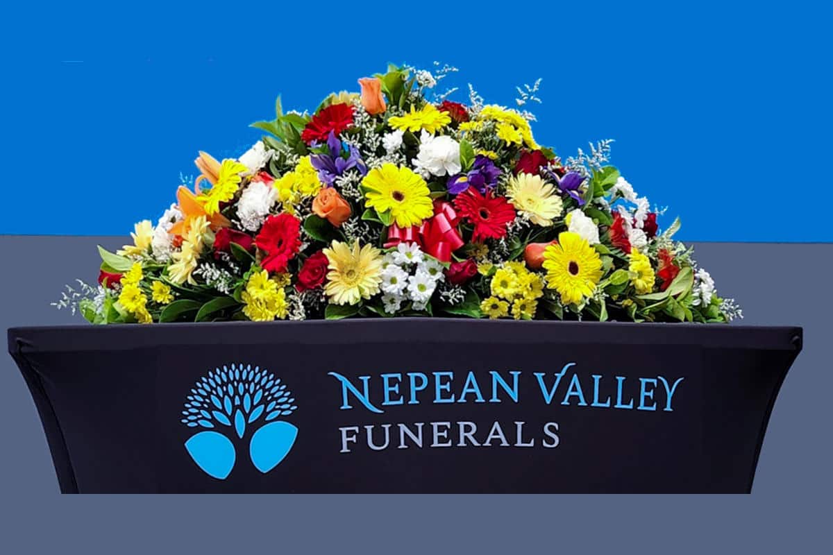 Funeral package – Mixed seasonal floral casket cover 4